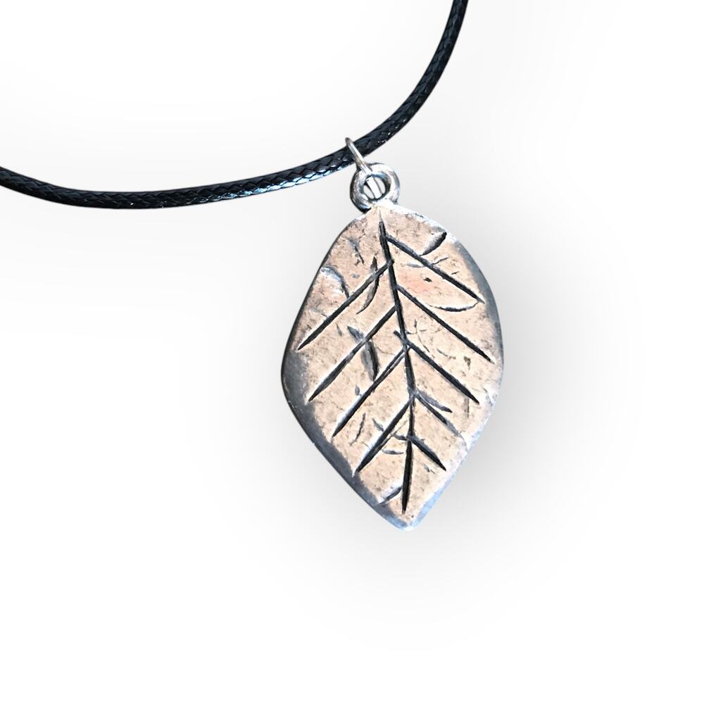 Silver tone abstract etched leaf pendant necklace, waxed black cotton cord